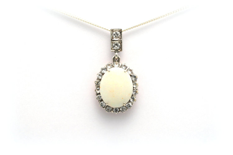 Pendentif Pendentif art déco en or jaune et argent serti d'une opale 58 Facettes B528