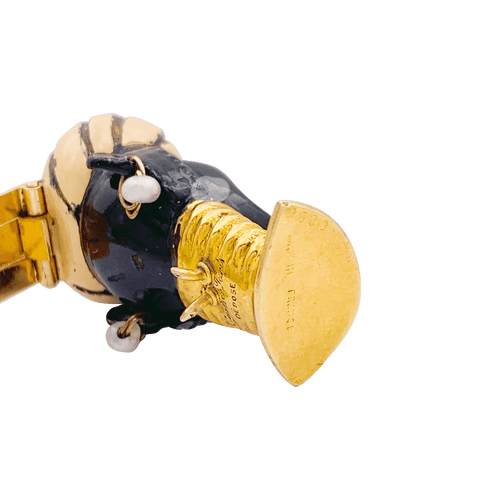 Broche Broche ancienne Cartier, "Tête de Maure", or jaune, argent, émail, diamants, turquoise. 58 Facettes 34520