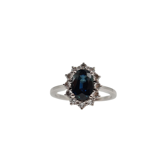 Carat white gold ring set with a sapphire and natural diamonds