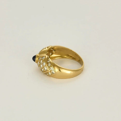 Bague 50 Bague nœud en or jaune 18K avec saphir cabochon et diamants 58 Facettes 58FC132