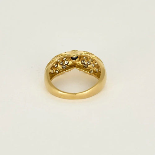 Bague 50 Bague nœud en or jaune 18K avec saphir cabochon et diamants 58 Facettes 58FC132