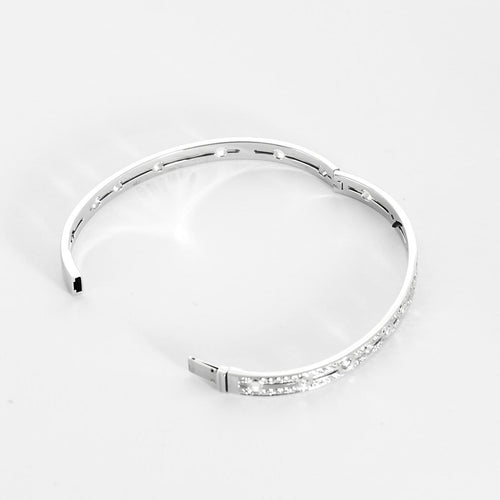 Bracelet Dinh Van Pulse - Bracelet rigide en or blanc pavé de diamants 58 Facettes 58FC161