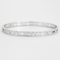 Bracelet Dinh Van Pulse - Bracelet rigide en or blanc pavé de diamants 58 Facettes 58FC161