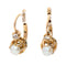 Boucles d'oreilles Boucles d’oreilles dormeuses en or 18k, perles et diamants taille rose 58 Facettes 05B74D8294B146B588081AF9D6B0066A