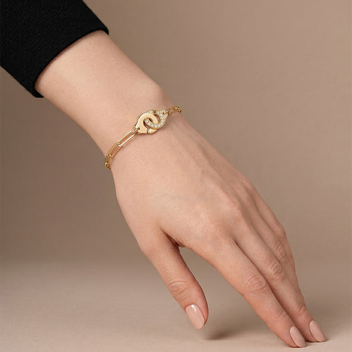 Bracelet dinh van Menottes - Bracelet R12 en or jaune et diamants 58 Facettes OC-62000272