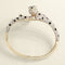 Bracelet Bracelet panthère en or jaune avec onyx, émeraudes et diamants 58 Facettes 62000207