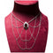 Collier Collier en or gris, grenat et diamants 58 Facettes 63700036