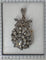 Pendentif Pendentif-broche victorien en or rouge 18k, argent et diamants 58 Facettes 23304-0153