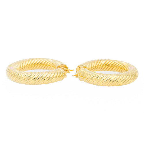 Boucles d'oreilles Boucles d'oreilles créoles torsadées en or jaune 18 carats 58 Facettes 1751503CN