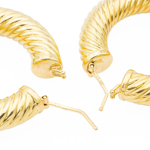 Boucles d'oreilles Boucles d'oreilles créoles torsadées en or jaune 18 carats 58 Facettes 1751503CN