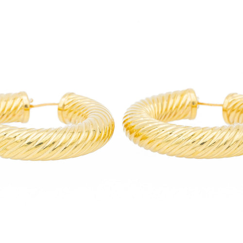 Boucles d'oreilles Boucles d'oreilles créoles torsadées en or jaune 18 carats 58 Facettes 1751503CN