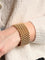 Bracelet Bracelet manchette maille grain de riz en or jaune 18 carats 58 Facettes 1888409CN