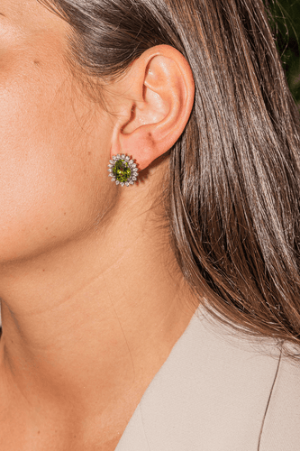 Boucles d'oreilles Boucles d’oreilles en or blanc 18 carats avec péridots et diamants 58 Facettes 3013258CN