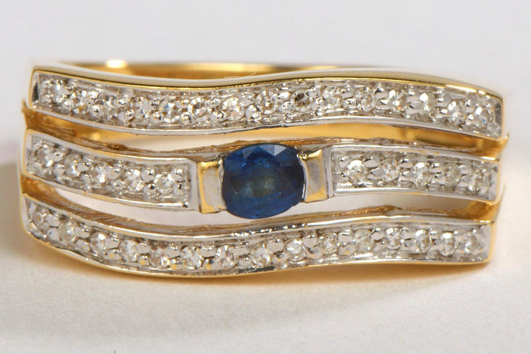 Bague 58 Bague en or jaune 18 carats avec saphir ovale et diamants 58 Facettes 00390CN