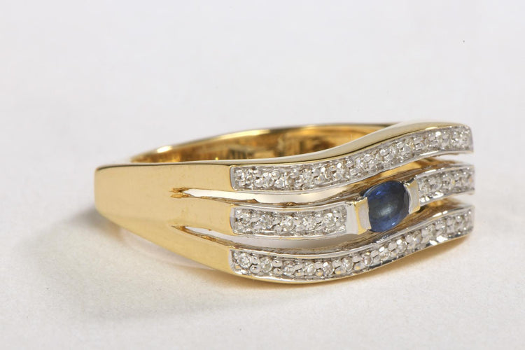 Bague 58 Bague en or jaune 18 carats avec saphir ovale et diamants 58 Facettes 00390CN