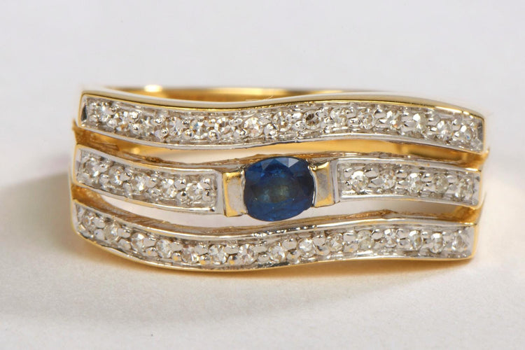 Bague 58 Bague en or jaune 18 carats avec saphir ovale et diamants 58 Facettes 00390CN