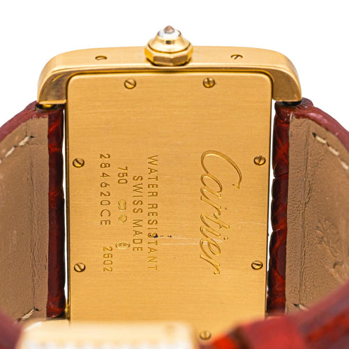 Montre Cartier Tank Divan - Montre en or jaune sertie de diamants 58 Facettes 4551671RV