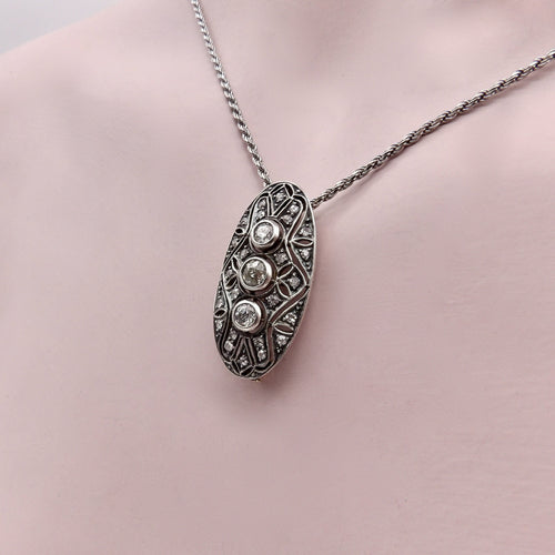 Broche Broche ovale victorienne en argent et or 14 ct avec diamants 58 Facettes