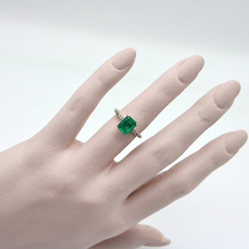 Bague Bague solitaire en platine avec émeraude et diamants 58 Facettes