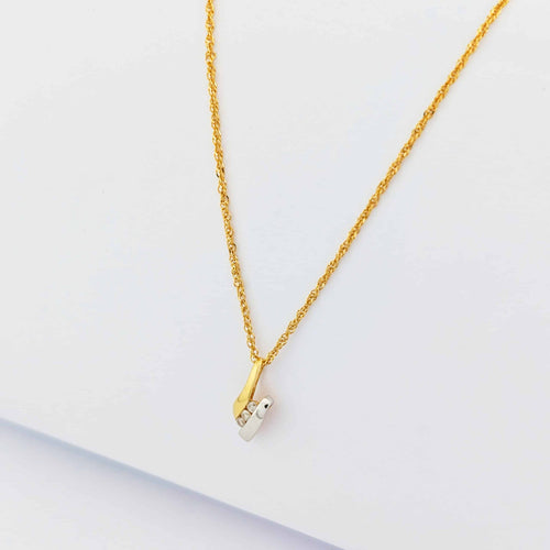 Collier Collier - Pendentif en or jaune et or blanc 18 carats et diamants 58 Facettes 33736