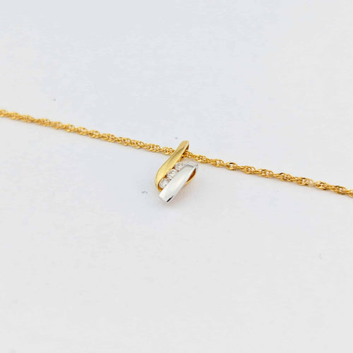 Collier Collier - Pendentif en or jaune et or blanc 18 carats et diamants 58 Facettes 33736