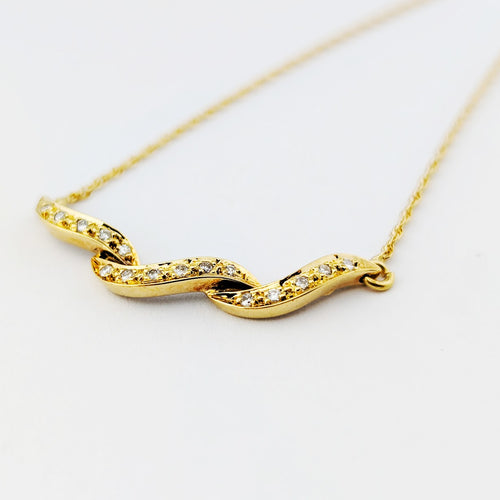 Collier Collier ruban en or jaune 18 carats et diamants 58 Facettes 33683