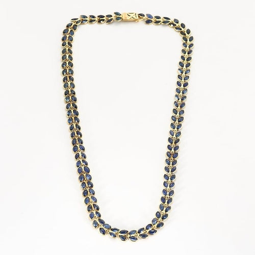 Collier Collier rivière à motif de feuilles en or jaune et saphirs 58 Facettes AUX1455
