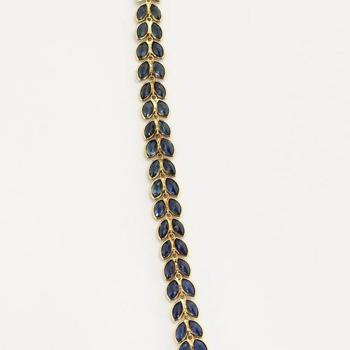 Collier Collier rivière à motif de feuilles en or jaune et saphirs 58 Facettes AUX1455