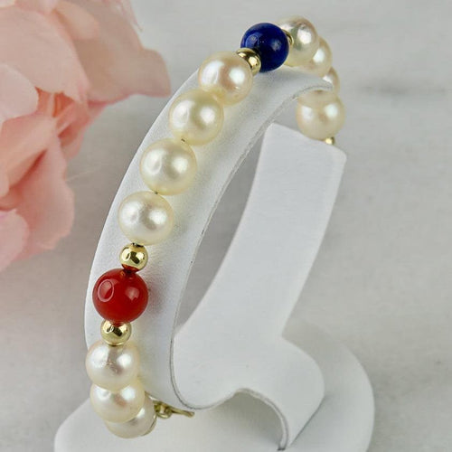 Bracelet Armband en perles, or 14 carats et pierres fines 58 Facettes 2306
