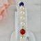 Bracelet Armband en perles, or 14 carats et pierres fines 58 Facettes 2306