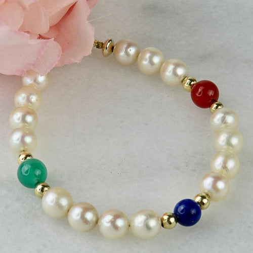 Bracelet Armband en perles, or 14 carats et pierres fines 58 Facettes 2306