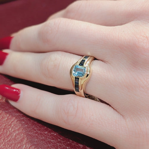 https://18carats.fr/wp-content/uploads/2025/12/33702-34388-Bague-en-or-jaune-saphirs-et-aigue-marine.jpg