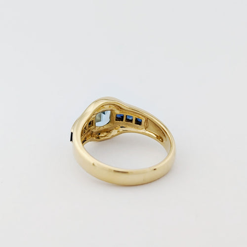 https://18carats.fr/wp-content/uploads/2025/12/33702-34385-Bague-en-or-jaune-saphirs-et-aigue-marine.jpg