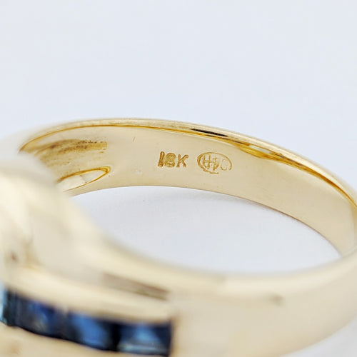 https://18carats.fr/wp-content/uploads/2025/12/33702-34387-Bague-en-or-jaune-saphirs-et-aigue-marine.jpg