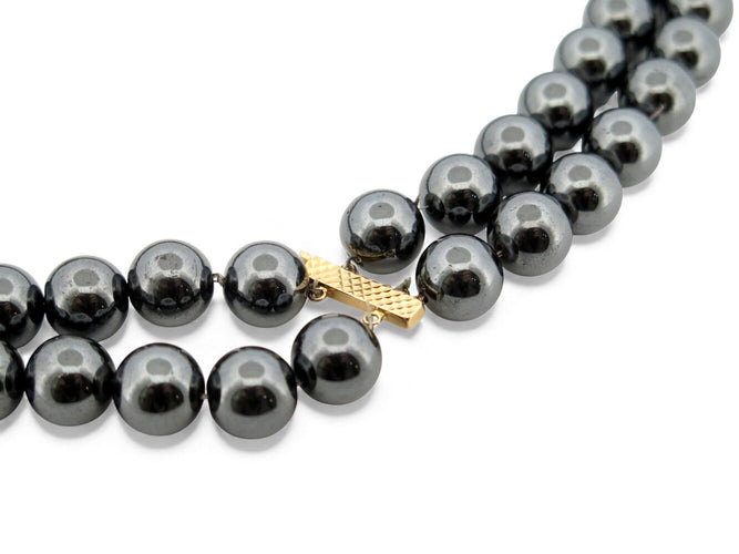 collar de dos hileras con perlas de hematites negras, oro amarillo de 18k y diamantes de 0,67ct 