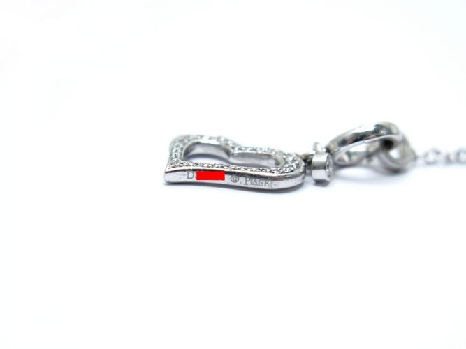 Collier Piaget Limelight - Collier chaîne Y avec pendentif cœur en or blanc et diamants 0,29 ct 58 Facettes 221585