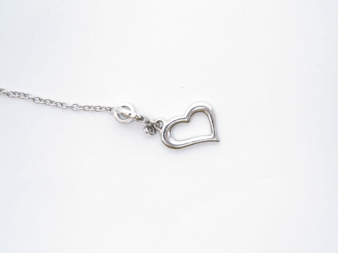 Collier Piaget Limelight - Collier chaîne Y avec pendentif cœur en or blanc et diamants 0,29 ct 58 Facettes 221585