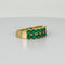 Bague 52 Bague vintage en or jaune 14k sertie d’émeraudes rondes 58 Facettes 2601022