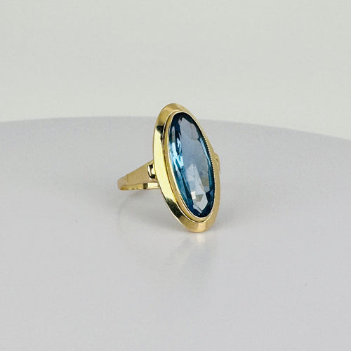 Bague 51 Bague vintage en or jaune 14 carats et topaze bleue 58 Facettes 2512021