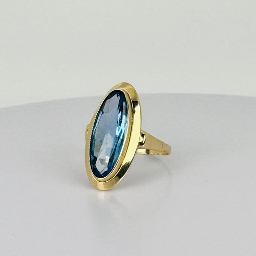 Bague 51 Bague vintage en or jaune 14 carats et topaze bleue 58 Facettes 2512021