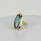 Bague 51 Bague vintage en or jaune 14 carats et topaze bleue 58 Facettes 2512021