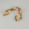 Bracelet Bracelet vintage en or jaune 14 carats et quartz rose 58 Facettes 2508034
