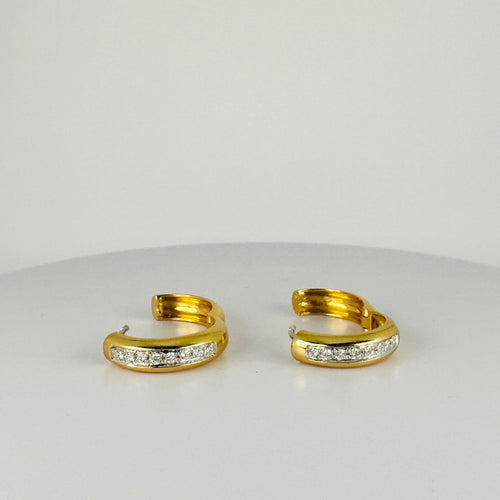 Boucles d'oreilles Créoles vintage en or jaune 14 carats et diamants 58 Facettes 2503038