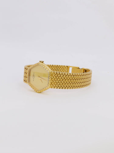 Montre Baume & Mercier - Montre vintage en or jaune 18 carats à maille tressée 58 Facettes 1067.3