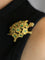 Broche Broche tortue en or jaune 18 carats, émeraudes et rubis 58 Facettes 1170.2