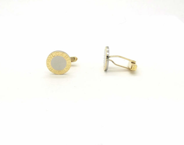 Boutons de manchette Bulgari - Boutons de manchette en or jaune 750 et acier 15 mm 58 Facettes 6454