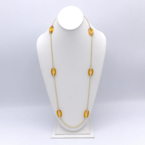 Collier Collier à maillons ovales en or jaune 14K et verre ambre sculpté 58 Facettes 10027