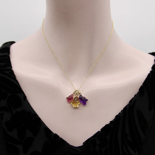 Pendentif Pendentif fleur en or 14k et améthyste sculptée 58 Facettes A2006V