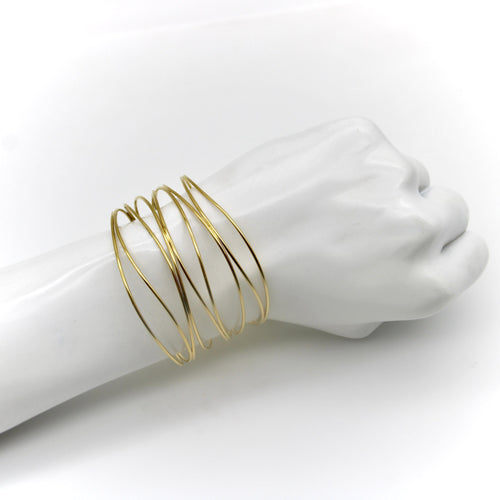 Bracelet Tiffany & Co. Elsa Peretti - Bracelet vague 9 rangs en or jaune 18 carats 58 Facettes