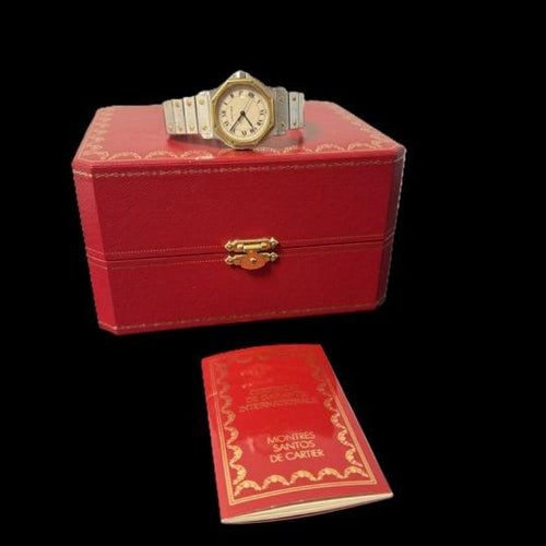 Montre Cartier Santos - Montre ronde octogonale en or jaune et acier 58 Facettes MT45173